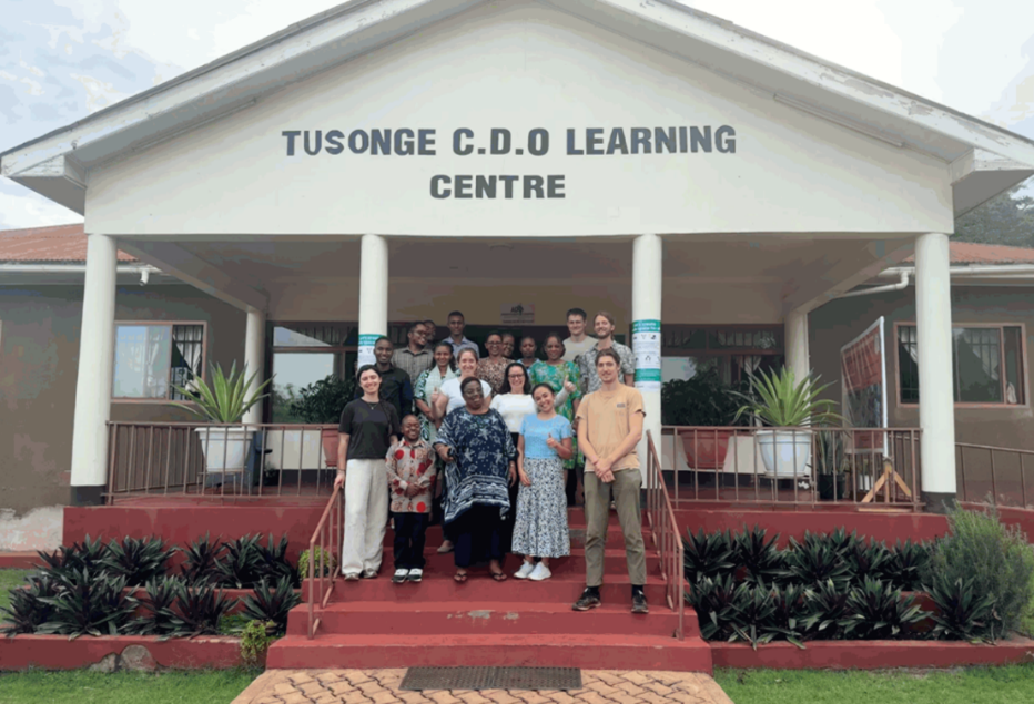 Crossroads volunteers Tara Scanlan, Jennifer Brinea and Nikki Salazar with TUSONGE team in Moshi, Tanzania.